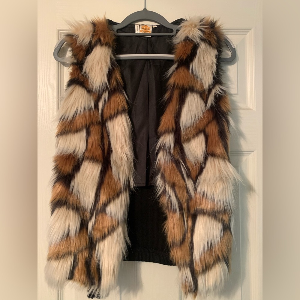 Sleeveless vest Size Medium black lining with multi color faux fur.